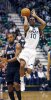 Alec-Burks-of-Utah-shoots-with-Derrick-Williams.jpg