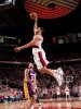 brandon-roy-of-the-portland-trailblazers-dunks-over-the-lakers-jordan-farmar-during-the-game.jpg
